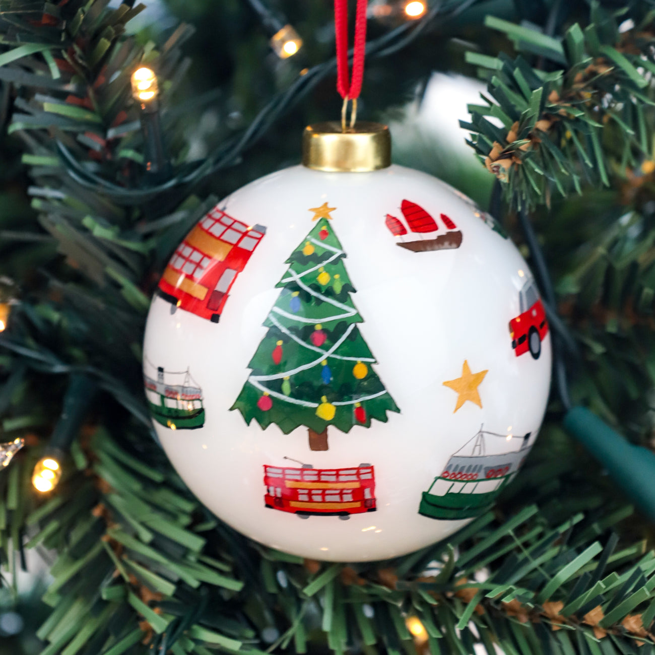 Transport Hand Painted Glass Ornament by Lion Rock Press